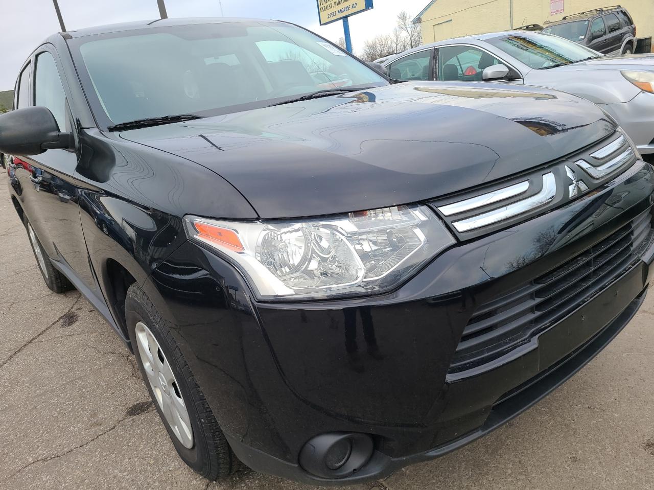 MITSUBISHI OUTLANDER 2014 with VIN JA4AD2A35EZ019847 - Photo from auction