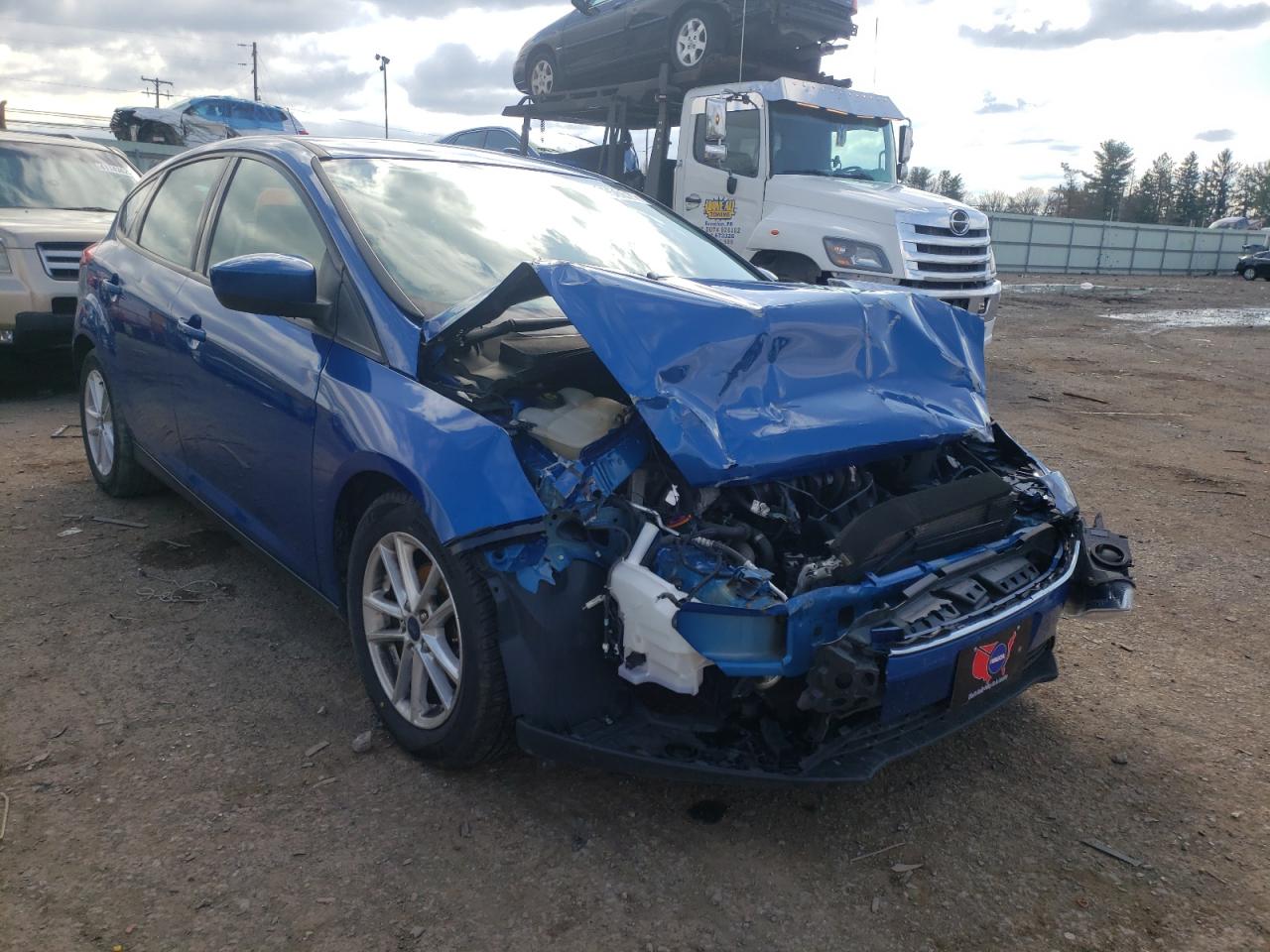 FORD FOCUS SE 2018 with VIN 1FADP3K22JL288767 - Photo from auction