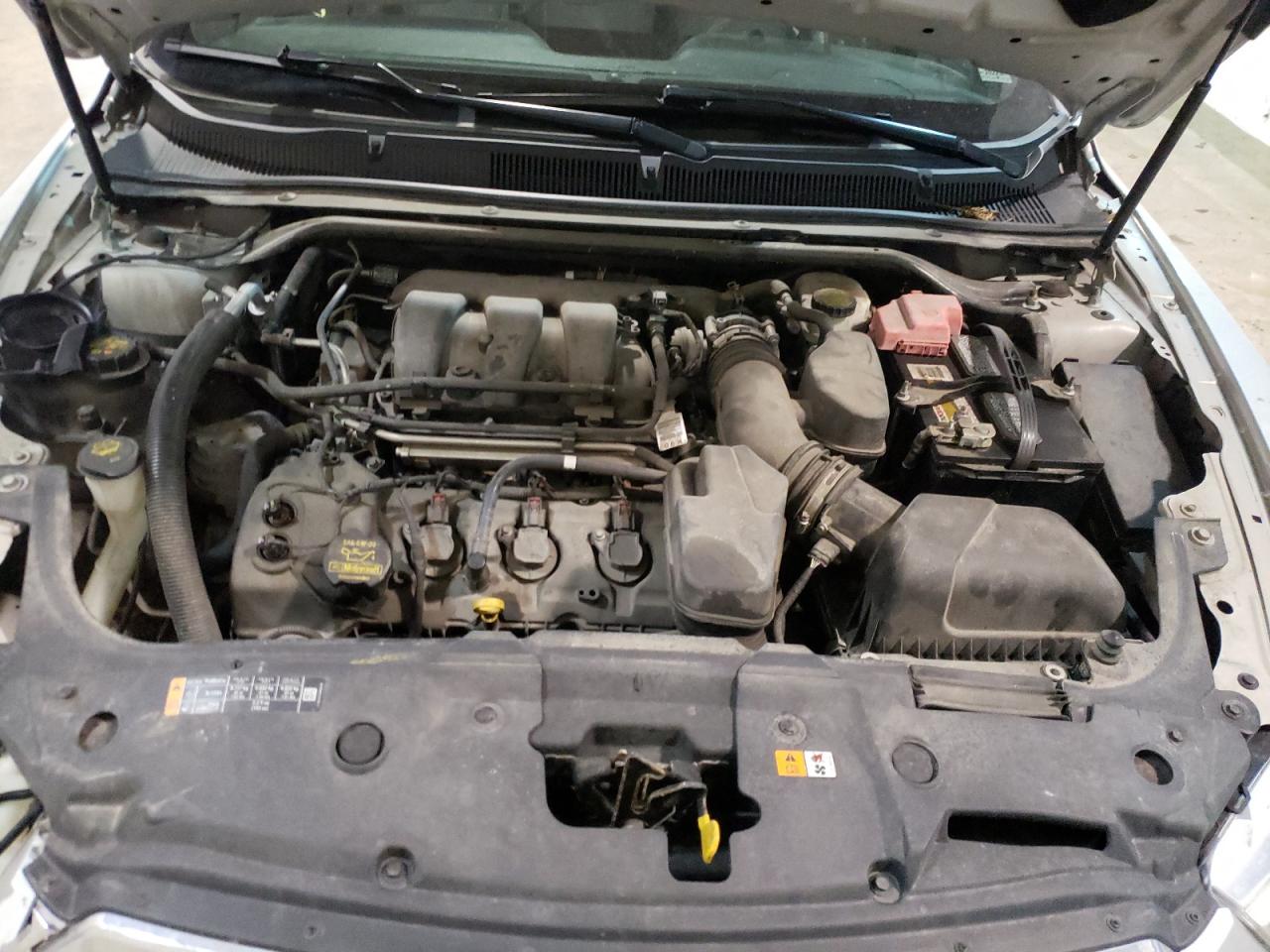 Photo 7 from auction – 2013 FORD TAURUS SEL with VIN 1FAHP2H81DG183190