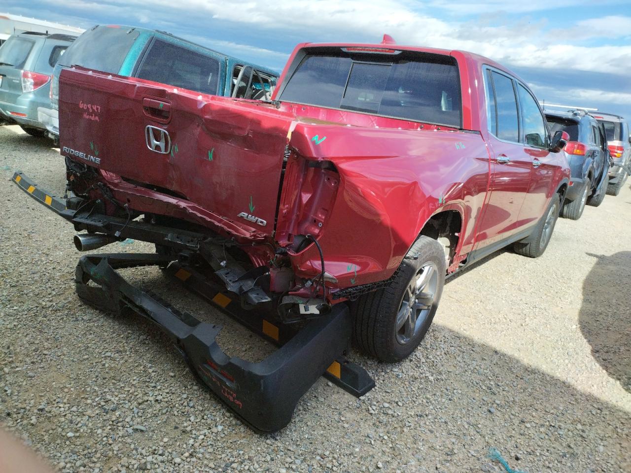 Photo 4 from auction – 2021 HONDA RIDGELINE with VIN 5FPYK3F74MB018048