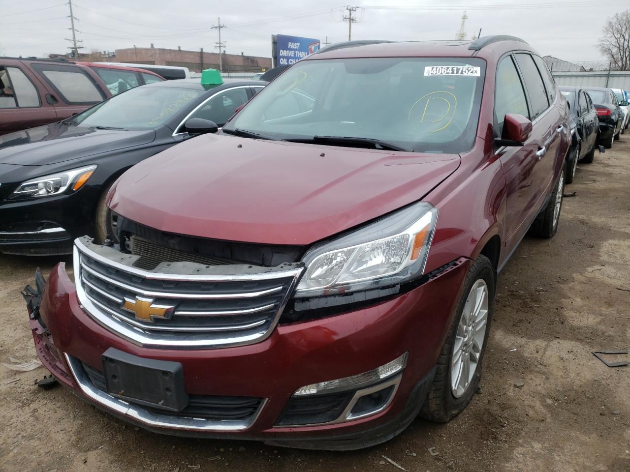Photo 2 from auction – 2015 CHEVROLET TRAVERSE L with VIN 1GNKRGKDXFJ389084
