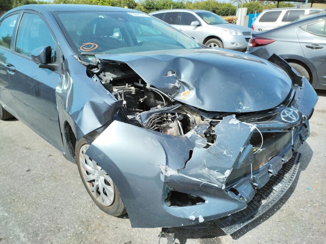 Photo 9 from auction – 2018 TOYOTA COROLLA L with VIN 5YFBURHEXJP830557