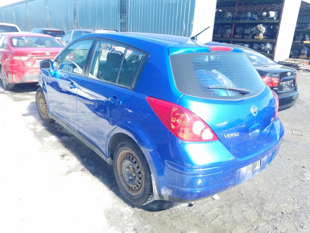Photo 3 from auction – 2009 NISSAN VERSA S/SL with VIN 3N1BC13E39L460785
