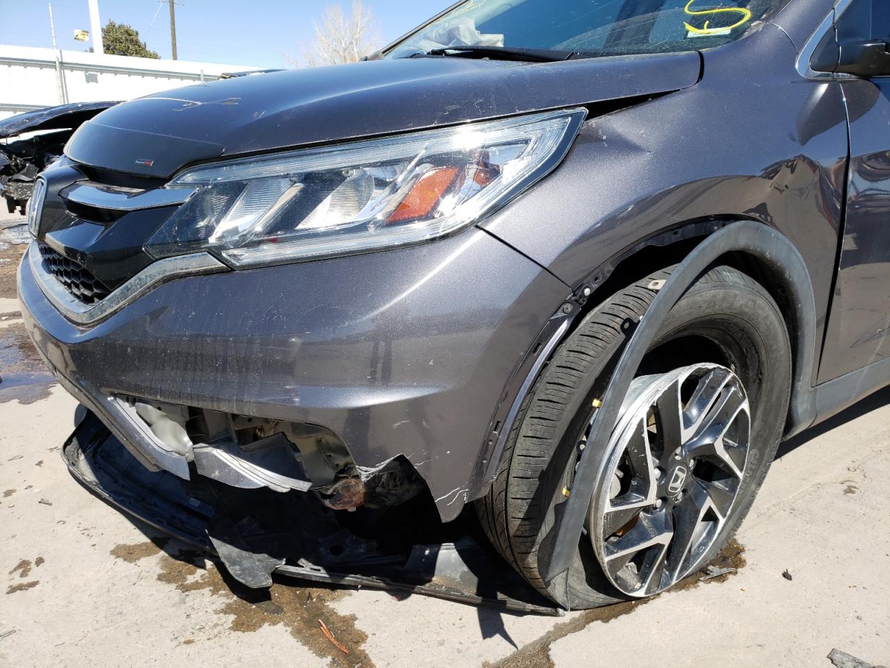 Photo 9 from auction – 2016 HONDA CR-V SE with VIN 2HKRM4H49GH689799