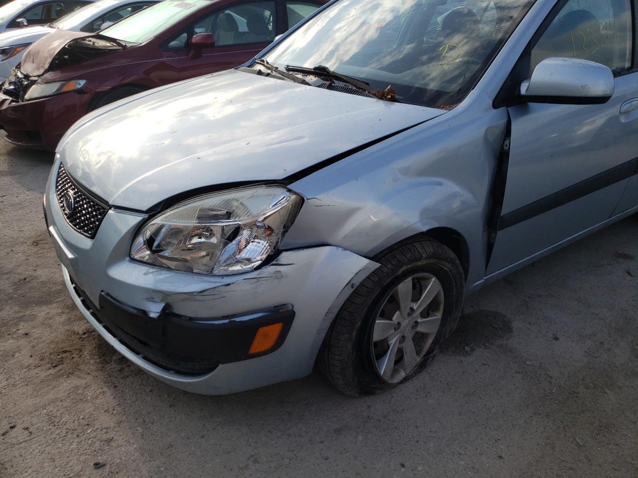 Photo 9 from auction – 2009 KIA RIO BASE with VIN KNADE223396447533