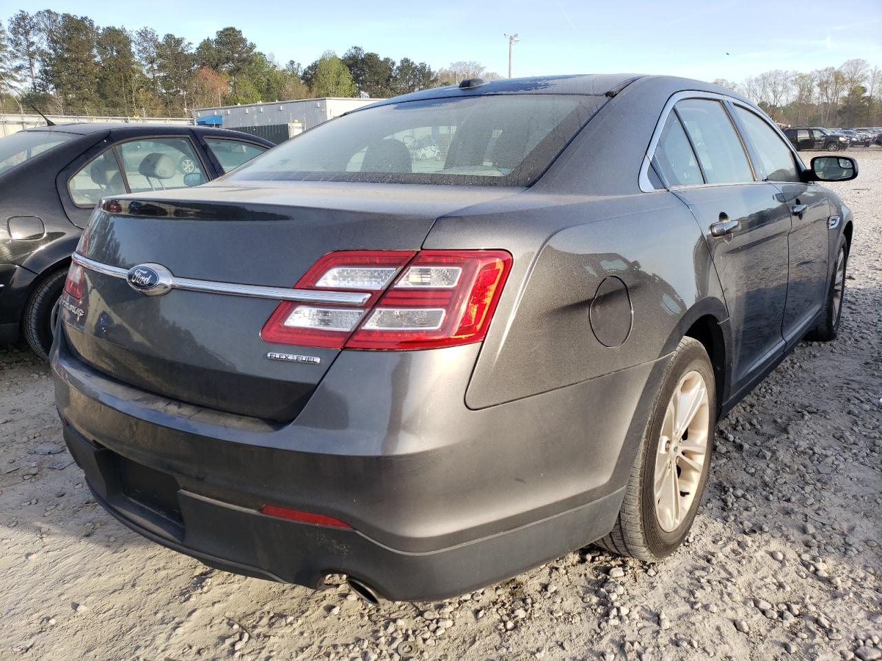 Photo 4 from auction – 2016 FORD TAURUS SE with VIN 1FAHP2D83GG116617