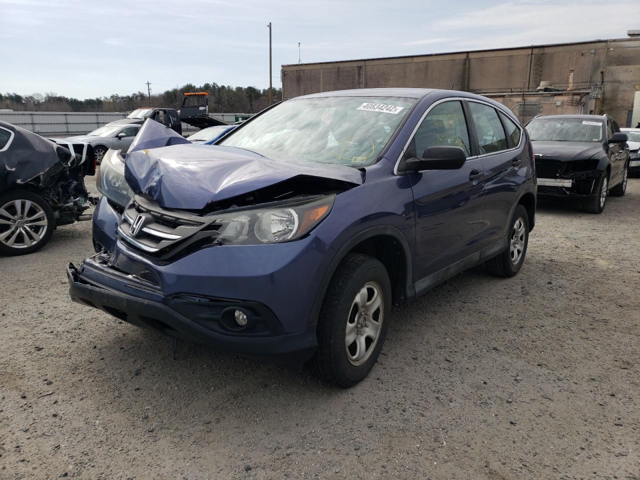 Photo 2 from auction – 2013 HONDA CR-V LX with VIN 2HKRM4H36DH683087