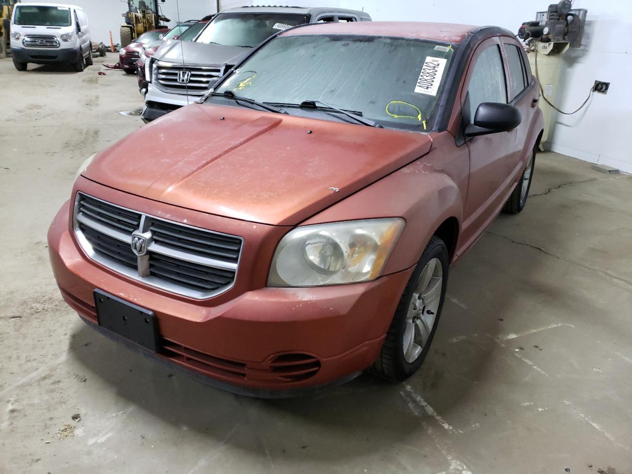 Photo 2 from auction – 2010 DODGE CALIBER SX with VIN 1B3CB4HA0AD586822