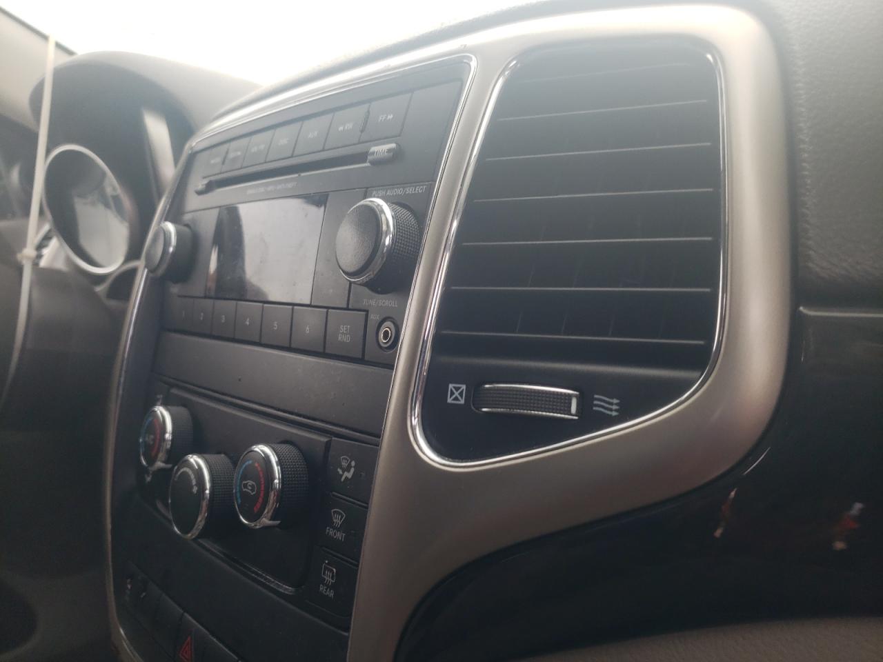 Photo 9 from auction – 2013 JEEP GRAND CHER with VIN 1C4RJFAG8DC572747