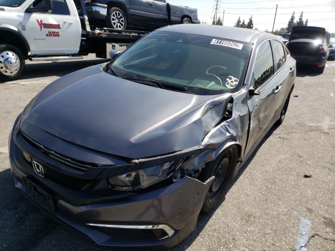 Photo 2 from auction – 2019 HONDA CIVIC LX with VIN 2HGFC2F64KH584573