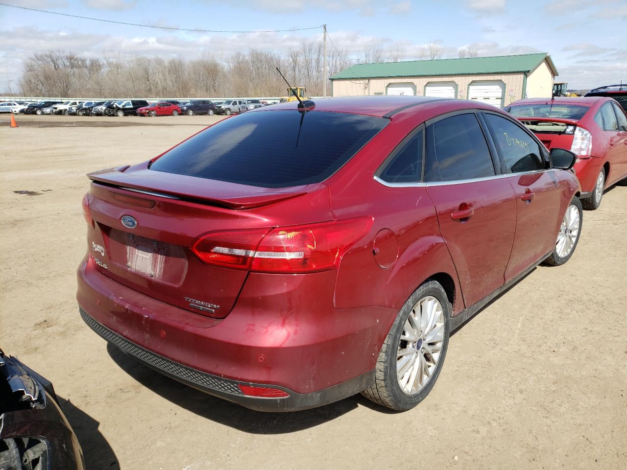 Photo 4 from auction – 2015 FORD FOCUS TITA with VIN 1FADP3J21FL239181