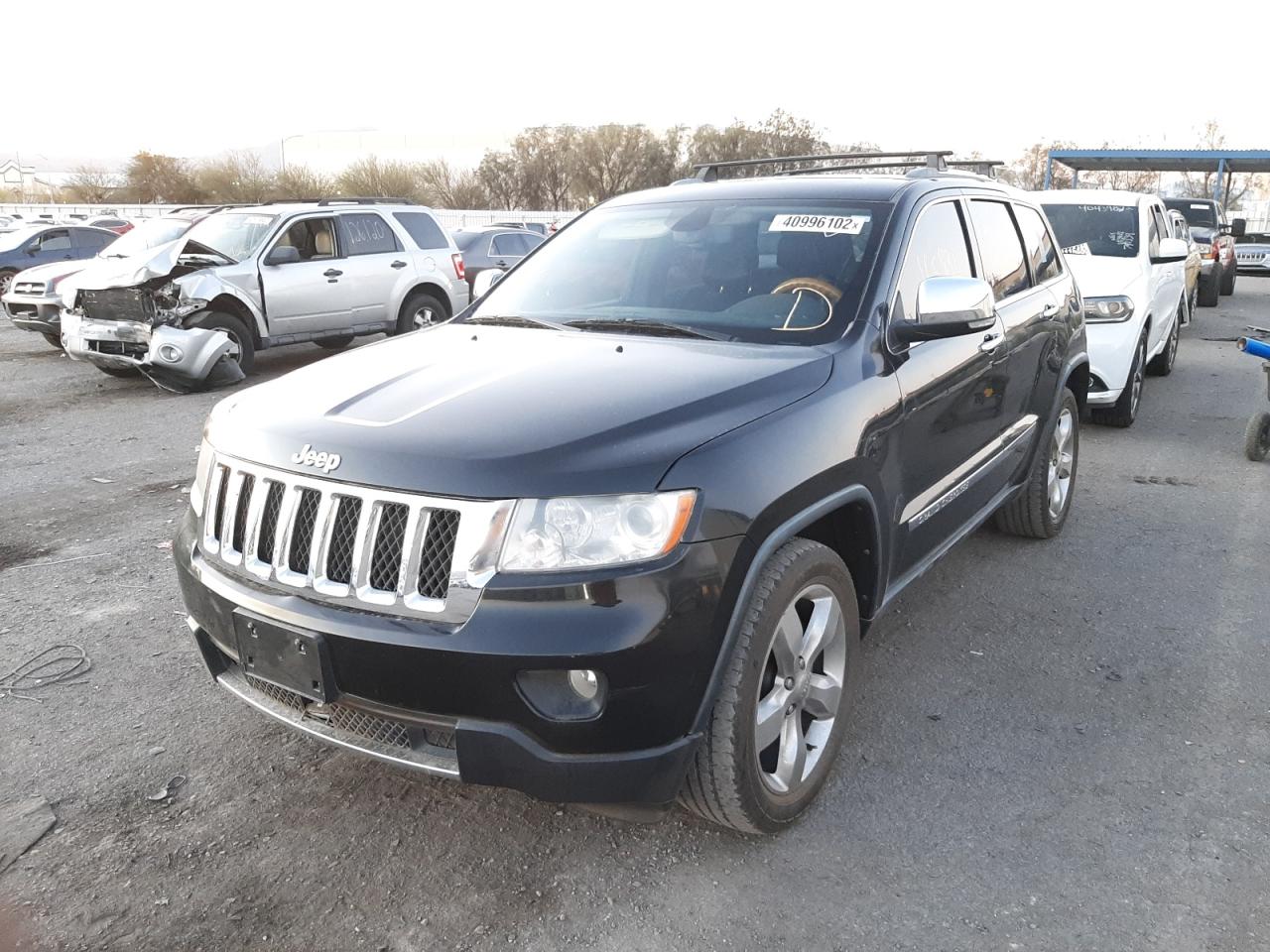 Photo 2 from auction – 2012 JEEP GRAND CHER with VIN 1C4RJECG4CC112281
