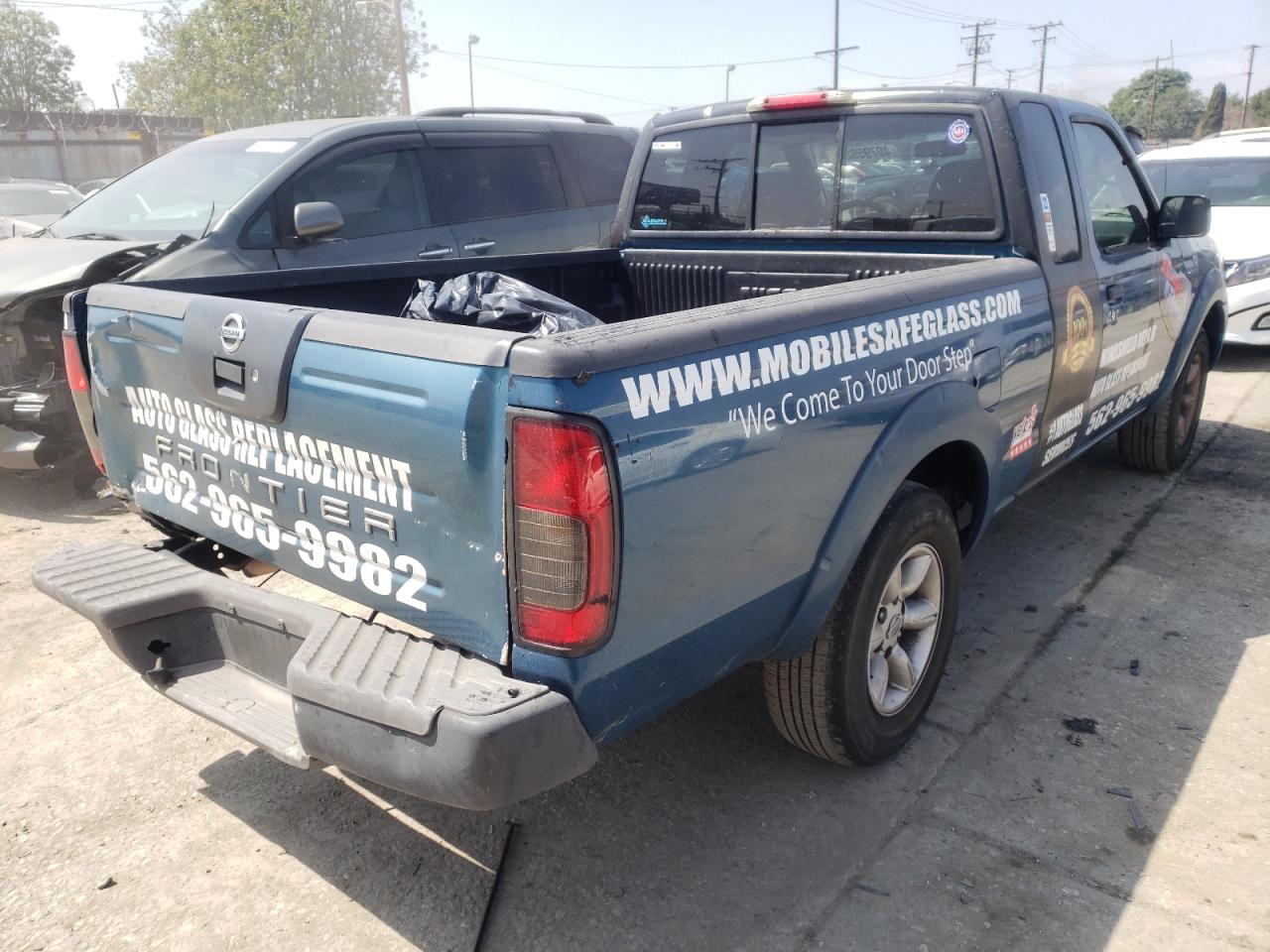 Photo 4 from auction – 2003 NISSAN FRONTIER K with VIN 1N6DD26T83C413884