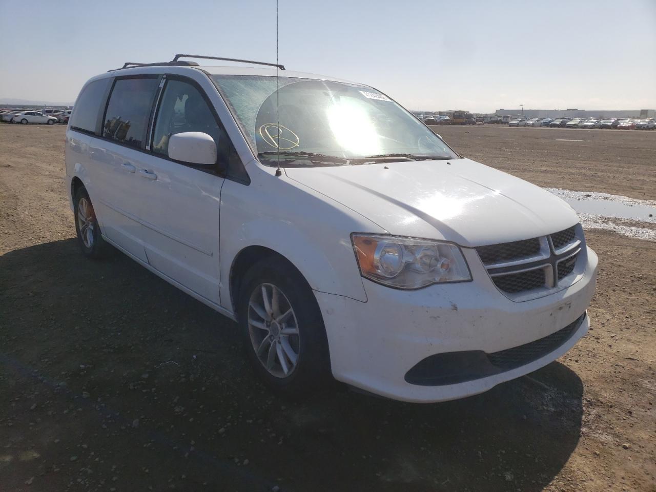 DODGE GRAND CARA 2015 with VIN 2C4RDGCG7FR745498 - Photo from auction