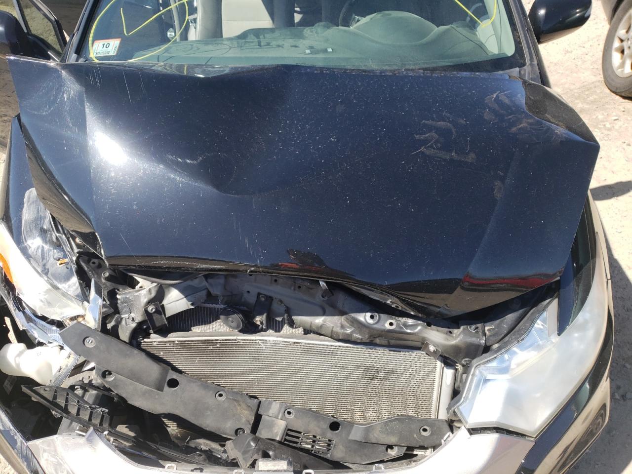 Photo 7 from auction – 2012 HONDA INSIGHT EX with VIN JHMZE2H72CS001020