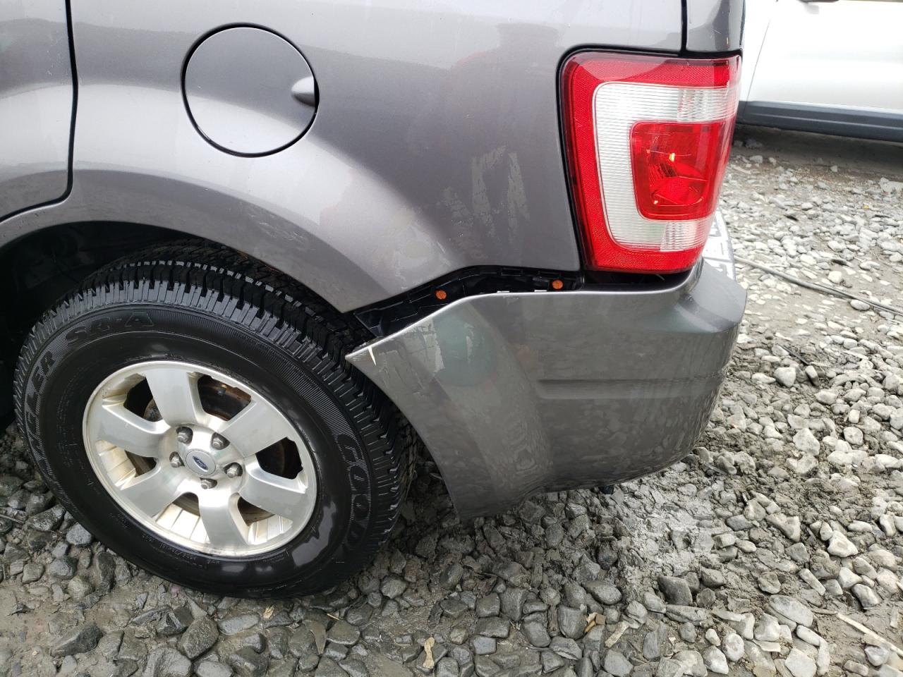 Photo 9 from auction – 2011 FORD ESCAPE LIM with VIN 1FMCU9EG6BKC06292