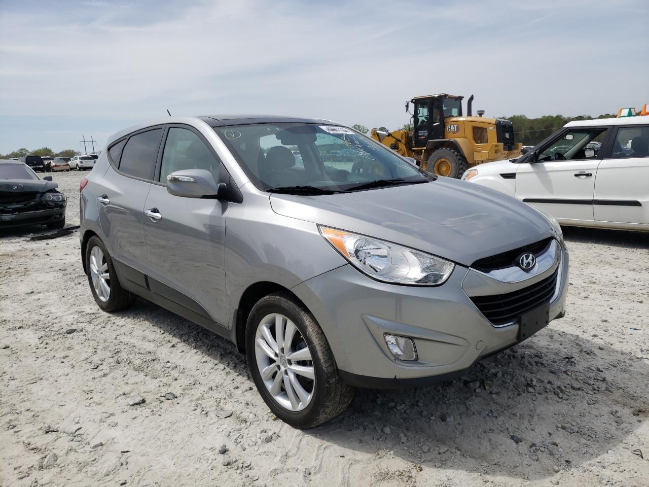 HYUNDAI TUCSON GLS 2013 with VIN KM8JUCAC0DU575891 - Photo from auction