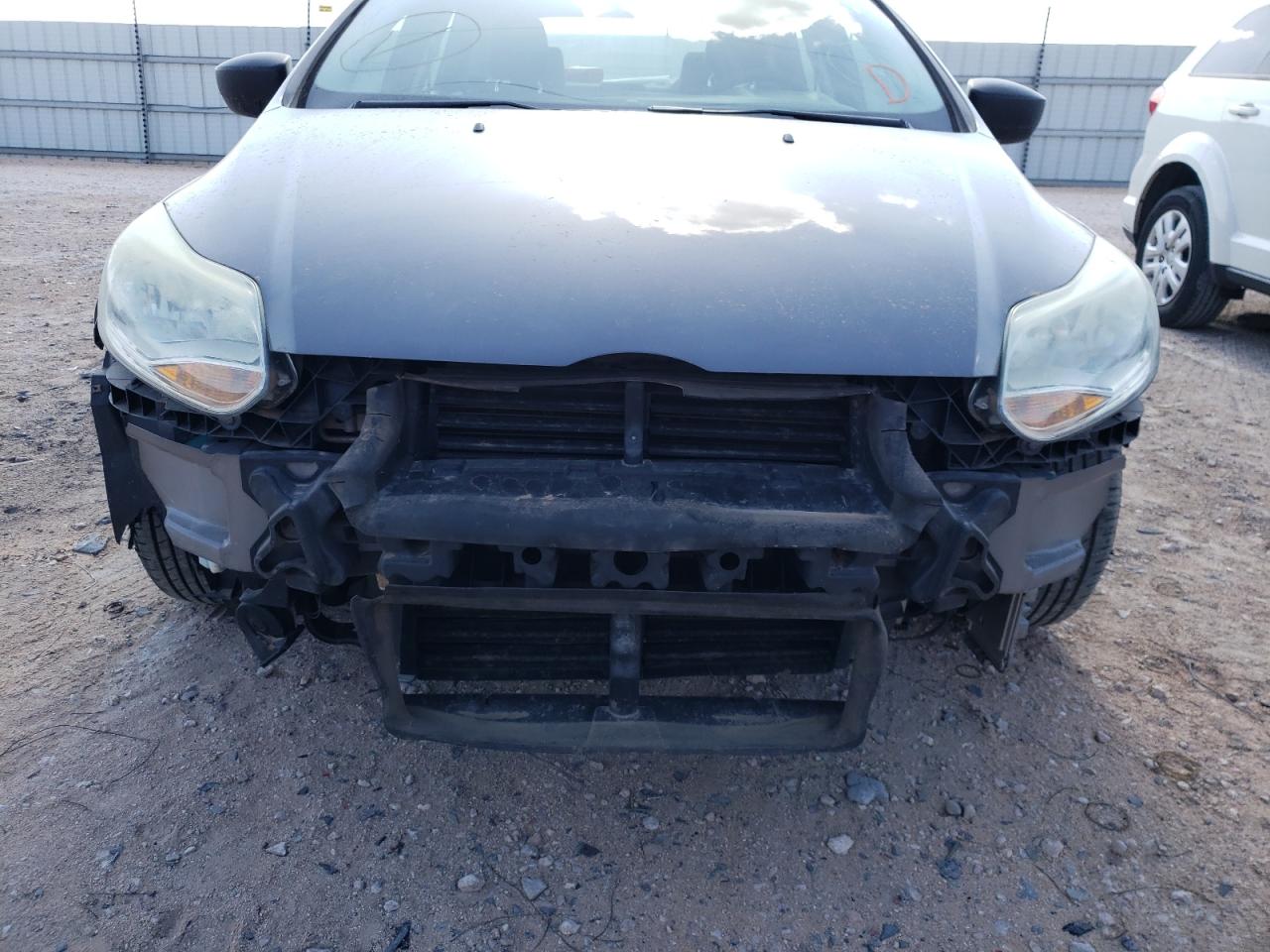 Photo 9 from auction – 2014 FORD FOCUS S with VIN 1FADP3E24EL419764