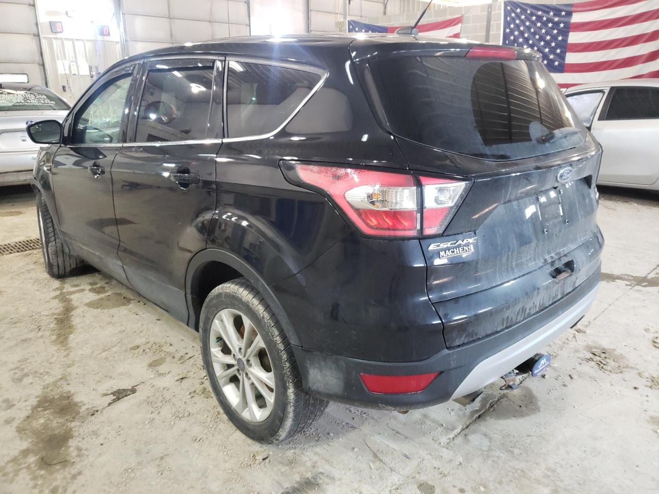 Photo 3 from auction – 2017 FORD ESCAPE SE with VIN 1FMCU9GD4HUD19691