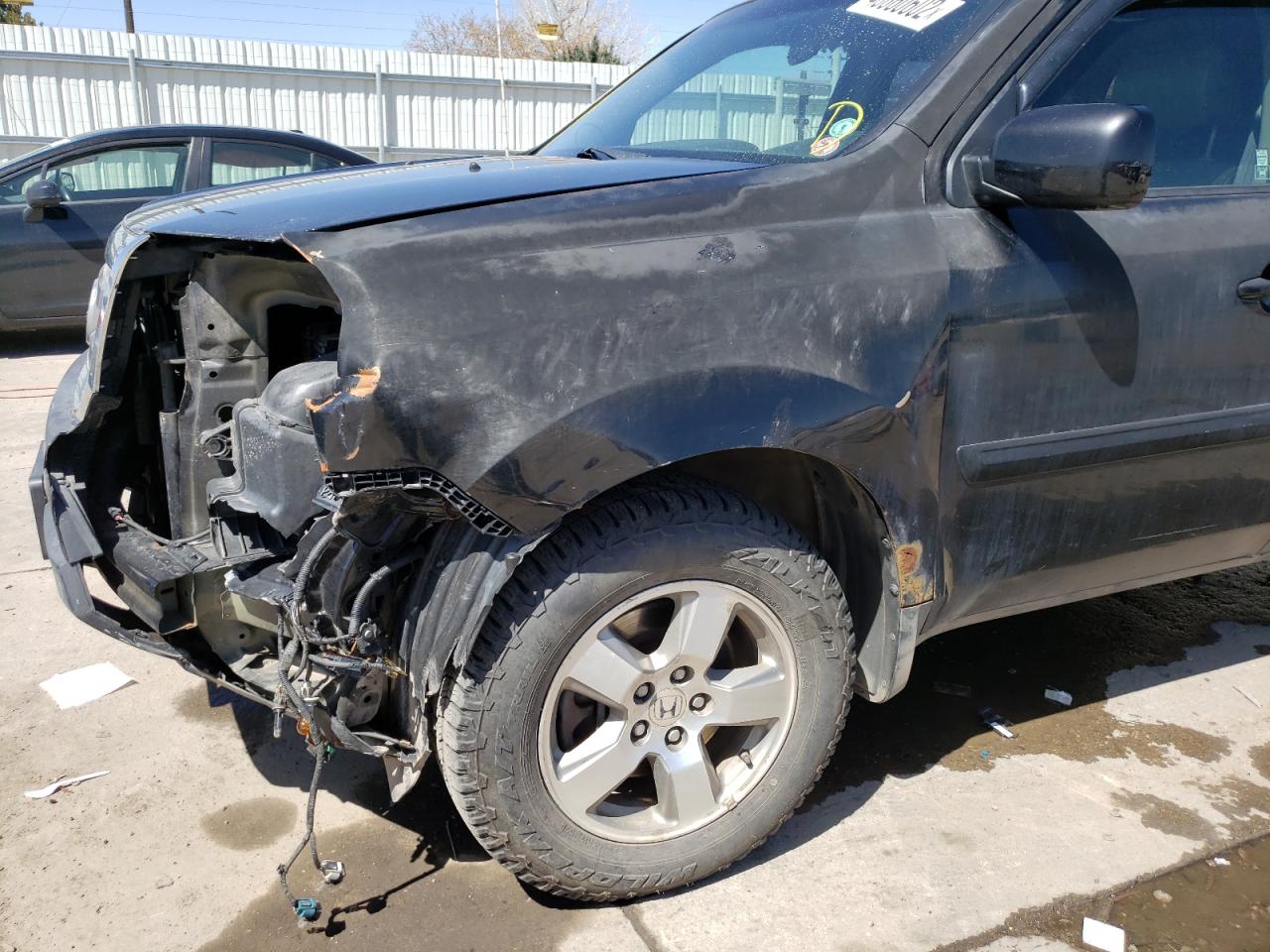 Photo 9 from auction – 2011 HONDA PILOT EX with VIN 5FNYF4H47BB015759