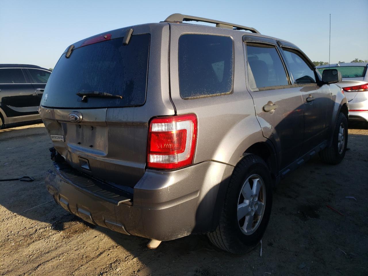 Photo 4 from auction – 2010 FORD ESCAPE XLT with VIN 1FMCU9D77AKD36792