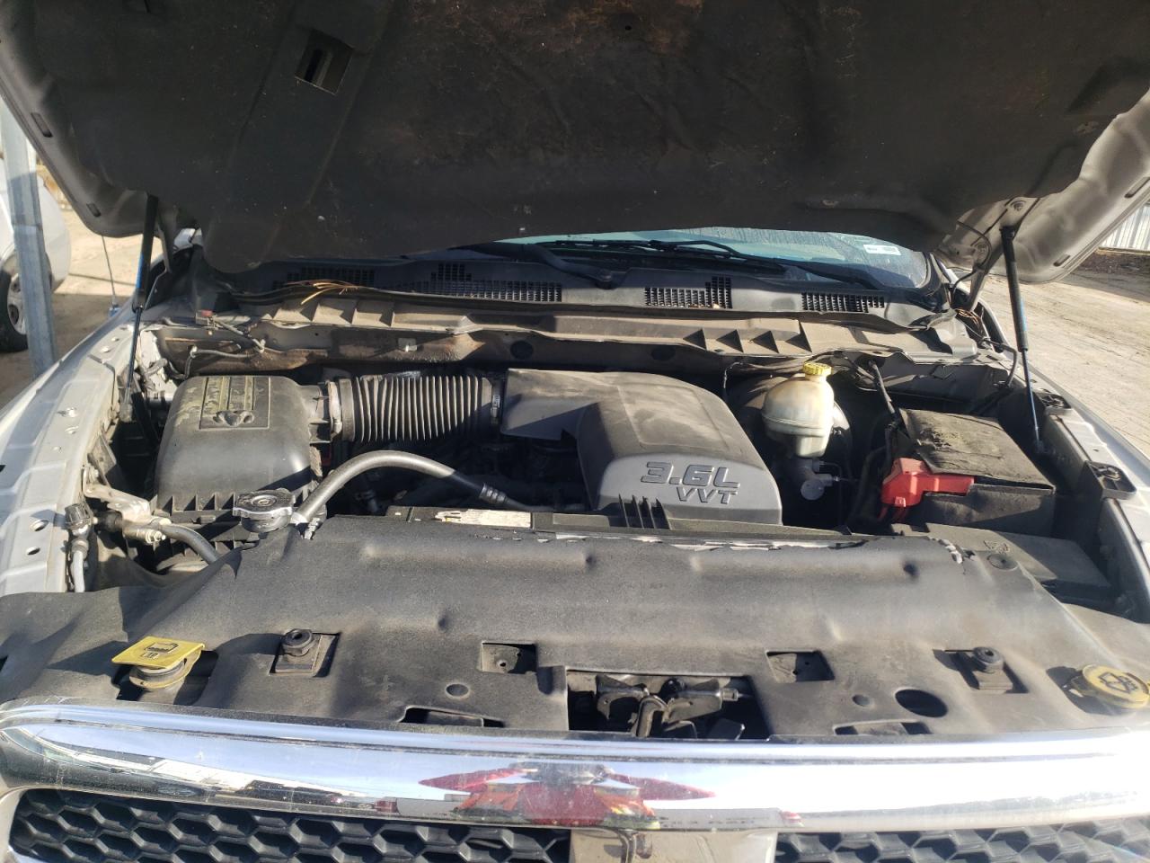 Photo 7 from auction – 2014 RAM 1500 SLT with VIN 1C6RR6LG5ES114684