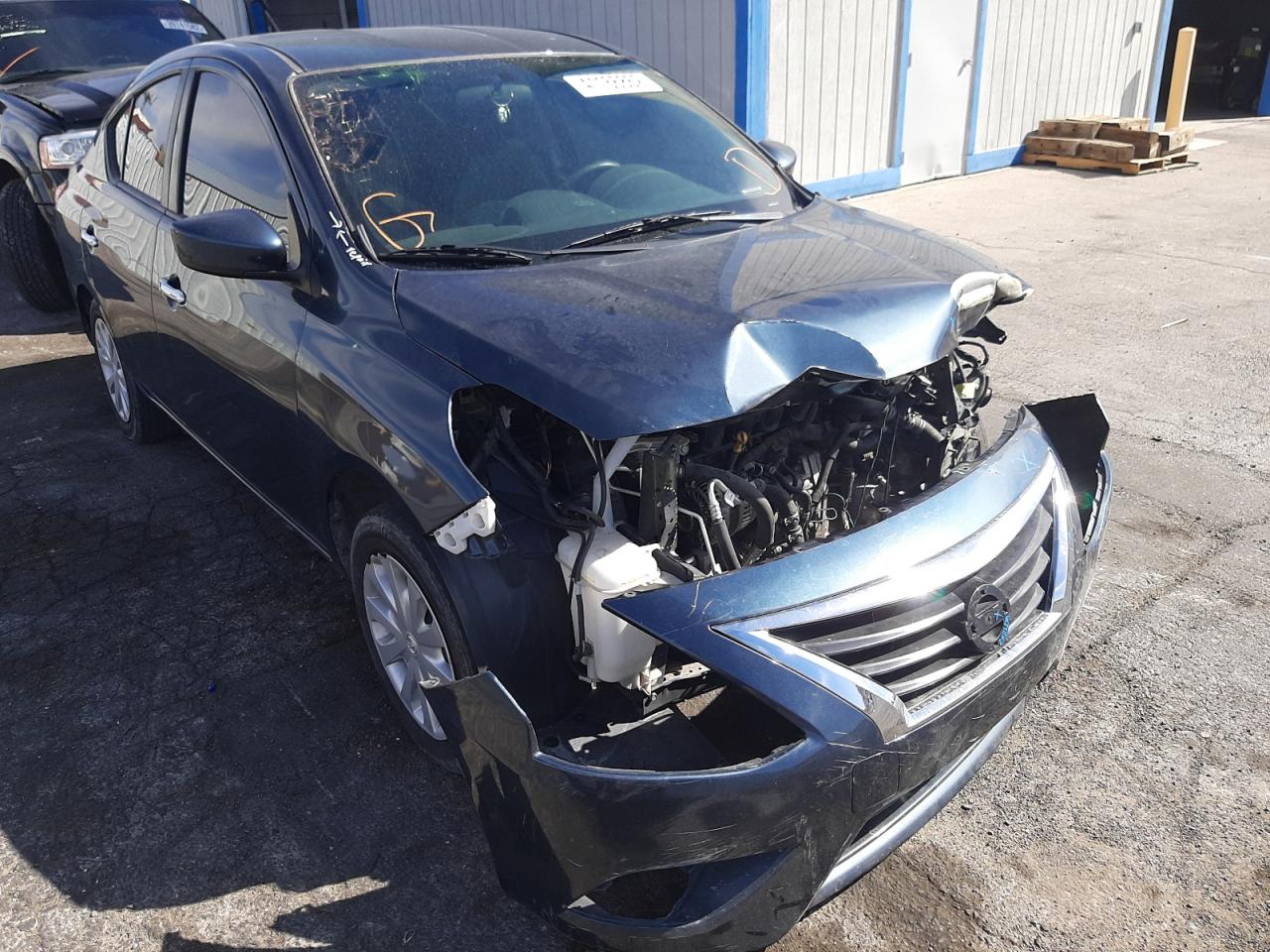 NISSAN VERSA S 2017 with VIN 3N1CN7AP2HL843363 - Photo from auction