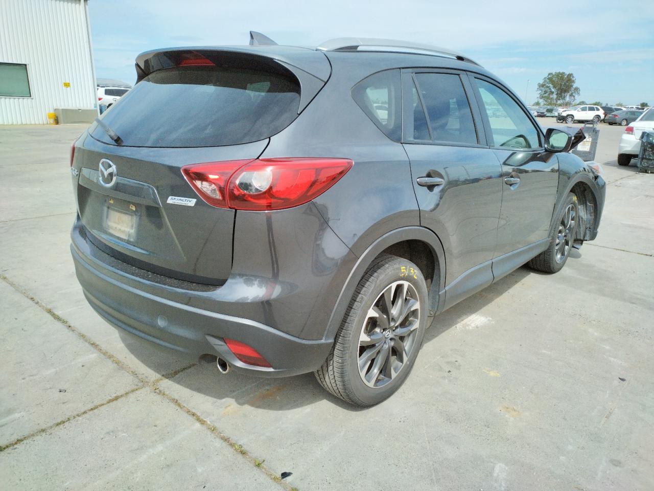 Photo 4 from auction – 2016 MAZDA CX-5 GT with VIN JM3KE2DY4G0787221
