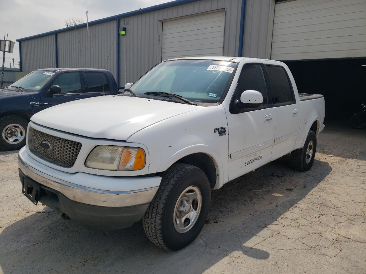 Photo 2 from auction – 2002 FORD F150 SUPER with VIN 1FTRW086X2KC75249