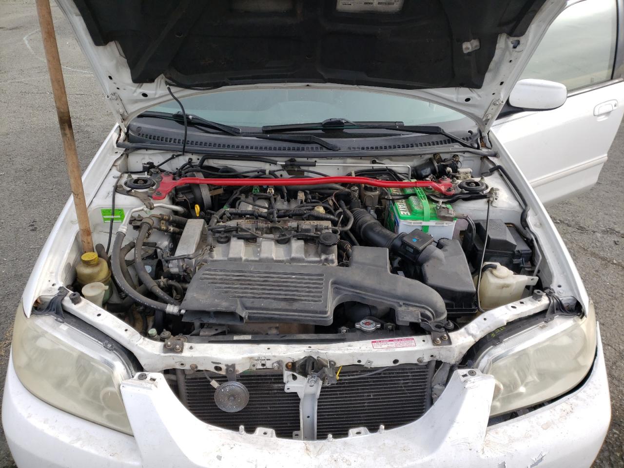 Photo 7 from auction – 2002 MAZDA PROTEGE PR with VIN JM1BJ245021618214