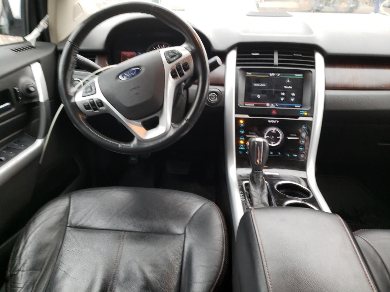 Photo 9 from auction – 2011 FORD EDGE LIMIT with VIN 2FMDK4KC1BBA40000