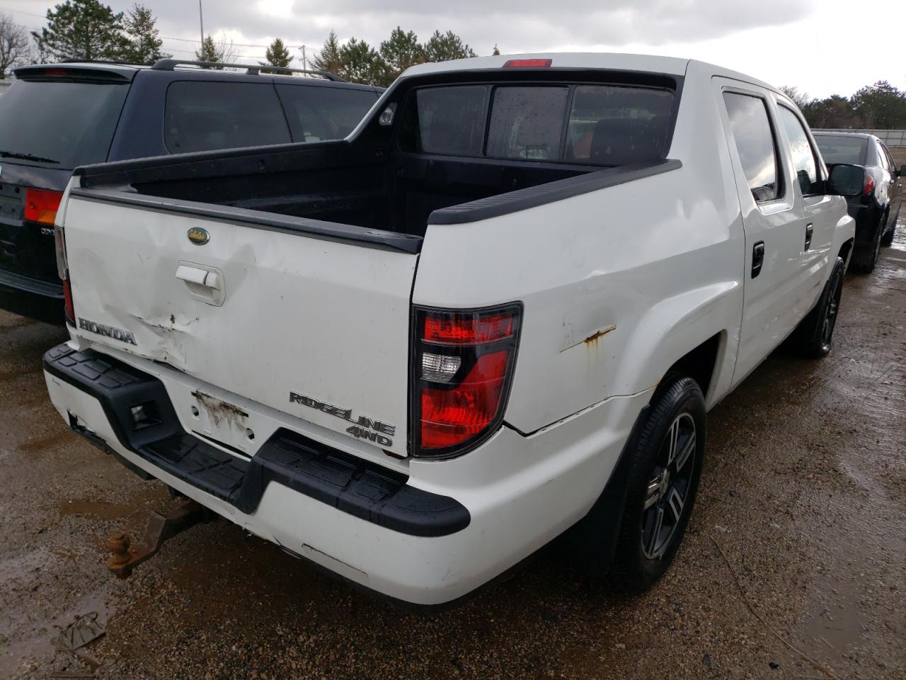 Photo 4 from auction – 2013 HONDA RIDGELINE with VIN 5FPYK1F77DB007095