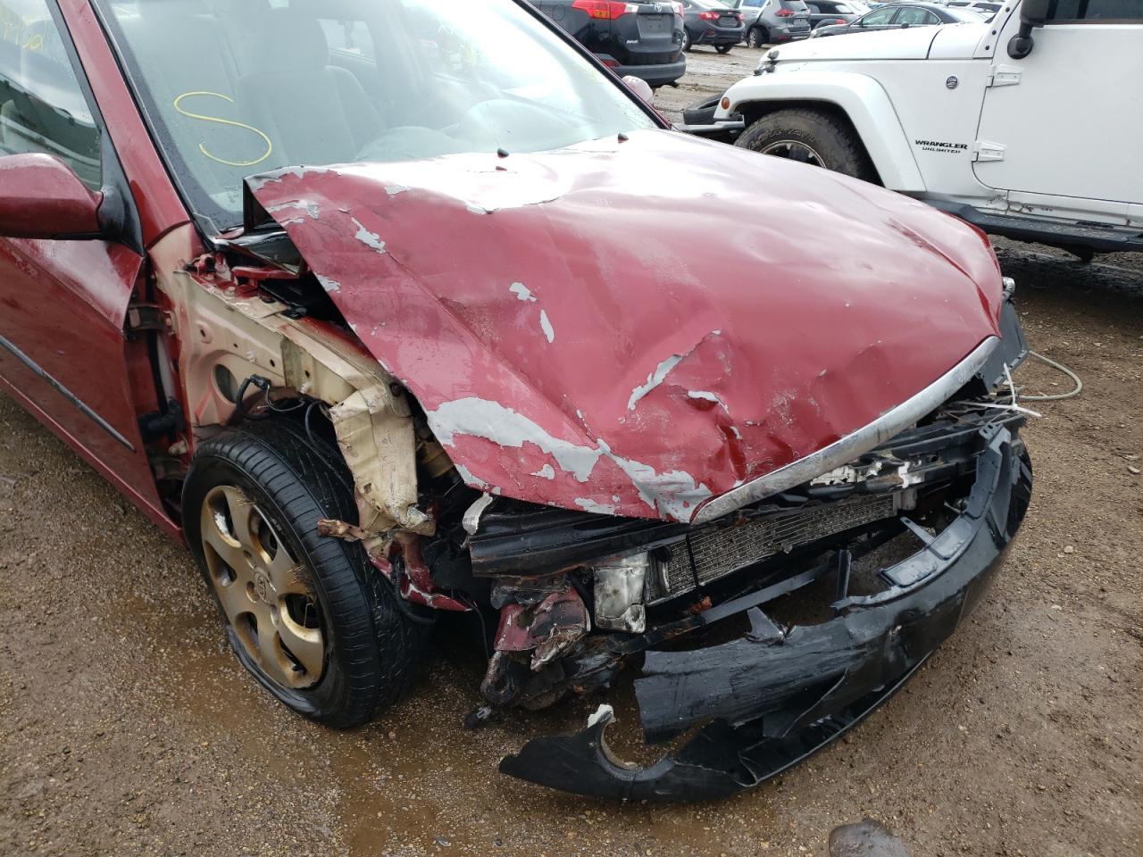 Photo 9 from auction – 2005 KIA SPECTRA LX with VIN KNAFE121055126292
