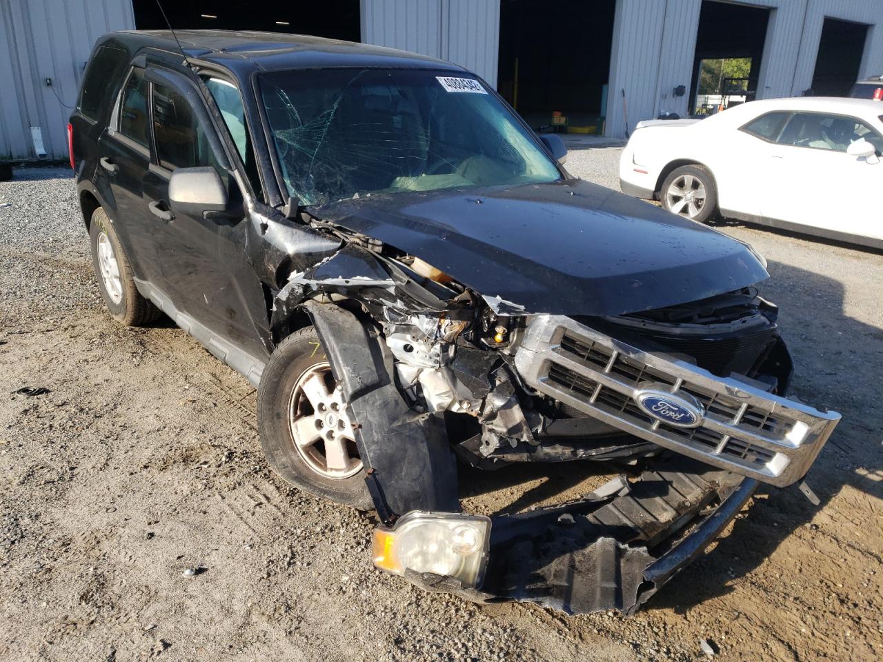 FORD ESCAPE XLS 2011 with VIN 1FMCU0C74BKC21517 - Photo from auction