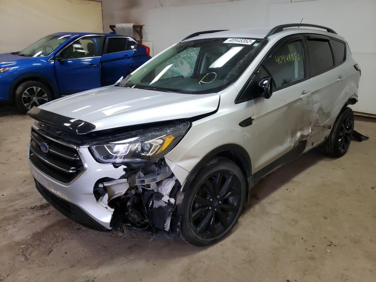 Photo 2 from auction – 2017 FORD ESCAPE SE with VIN 1FMCU9G90HUE10744