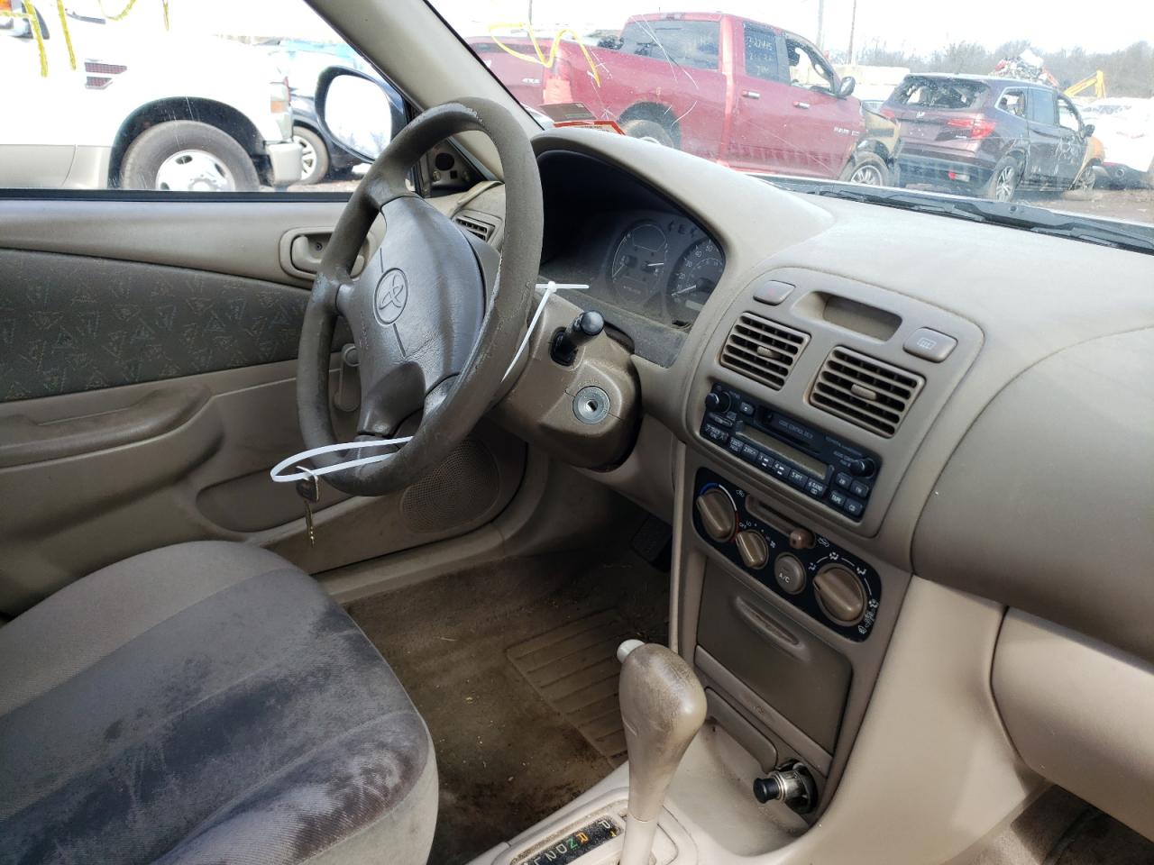 Photo 9 from auction – 1999 TOYOTA COROLLA VE with VIN 2T1BR12E2XC166243