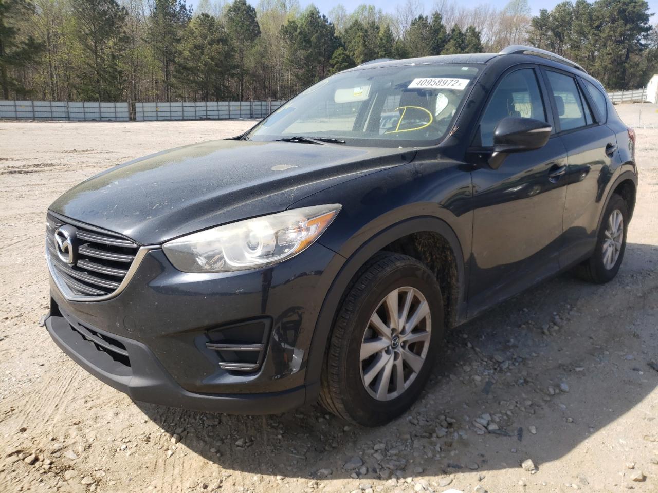 Photo 2 from auction – 2016 MAZDA CX-5 SPORT with VIN JM3KE2BY7G0767967