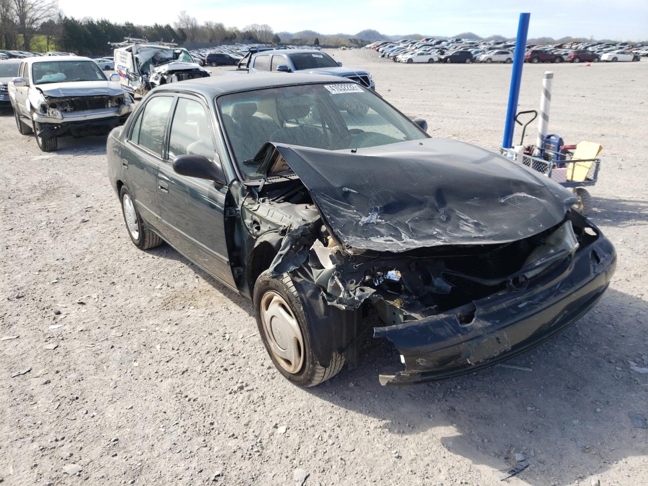 TOYOTA COROLLA VE 1999 with VIN 2T1BR12E6XC190576 - Photo from auction