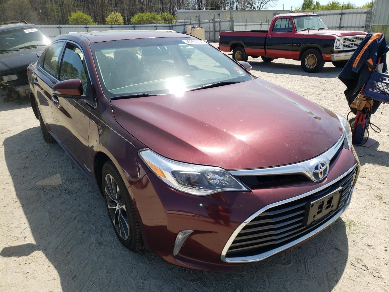 TOYOTA AVALON HYB 2016 with VIN 4T1BD1EB8GU055338 - Photo from auction