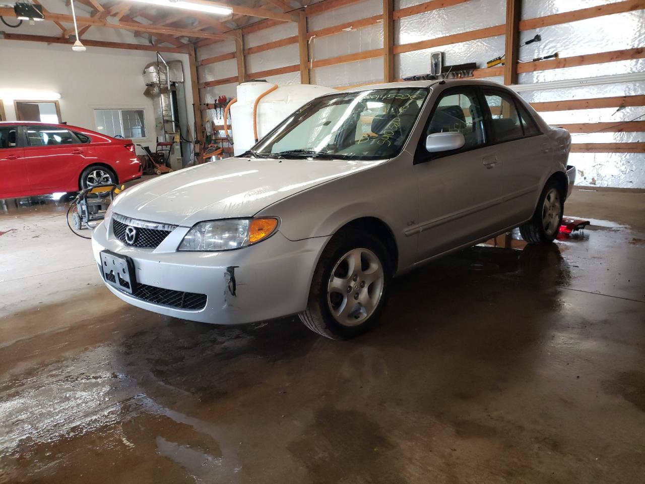 Photo 2 from auction – 2002 MAZDA PROTEGE DX with VIN JM1BJ225220540320