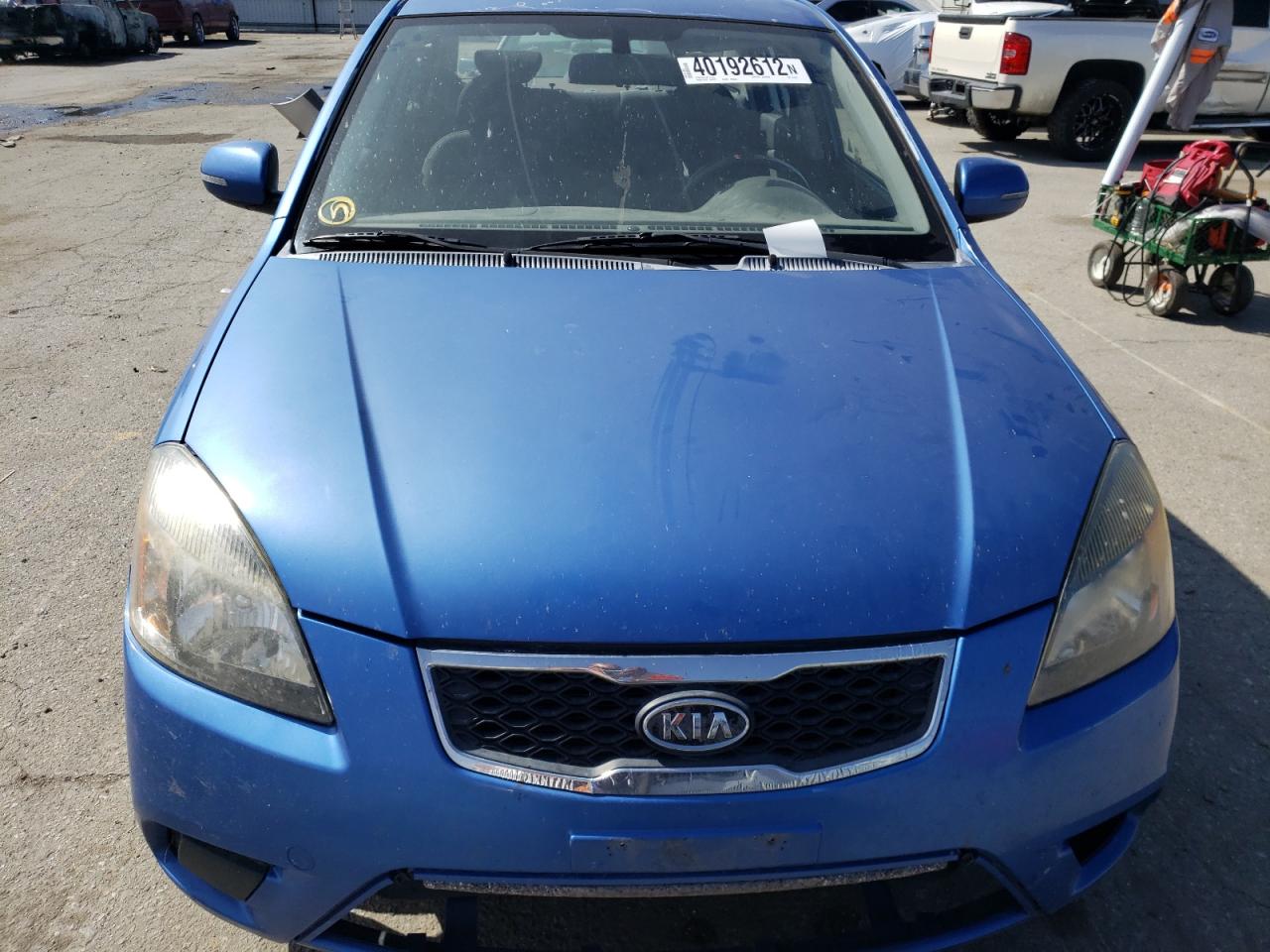 Photo 9 from auction – 2010 KIA RIO LX with VIN KNADH4A35A6711912