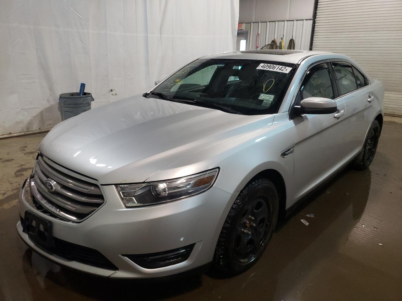 Photo 2 from auction – 2013 FORD TAURUS SEL with VIN 1FAHP2H81DG183190