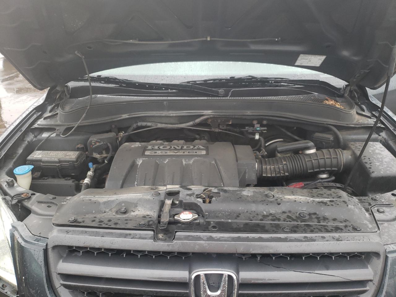 Photo 7 from auction – 2005 HONDA PILOT EXL with VIN 5FNYF18595B050864