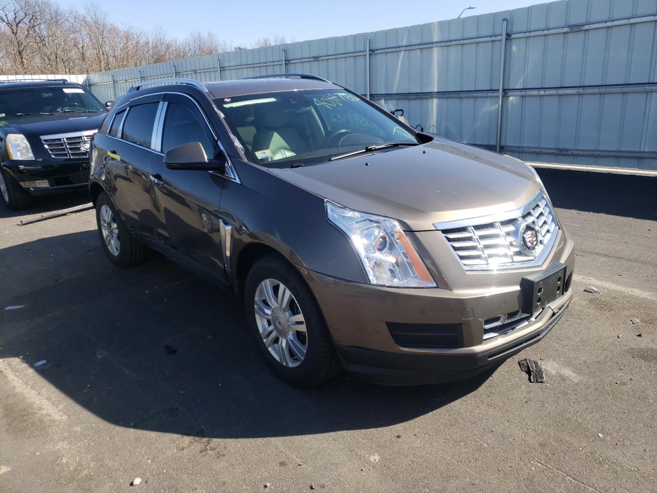 CADILLAC SRX LUXURY 2015 with VIN 3GYFNEE3XFS637145 - Photo from auction