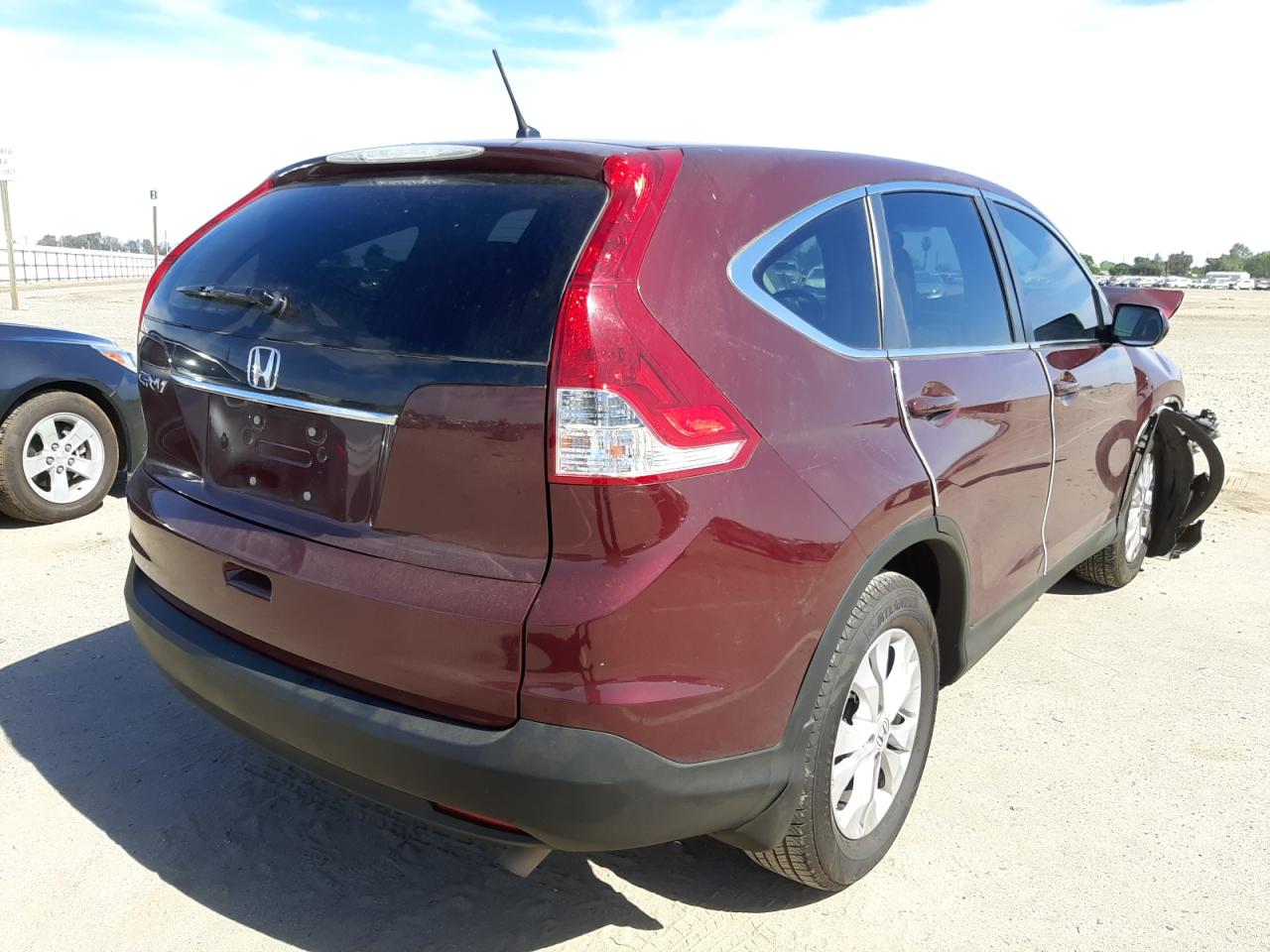Photo 4 from auction – 2012 HONDA CR-V EX with VIN 5J6RM3H5XCL039835