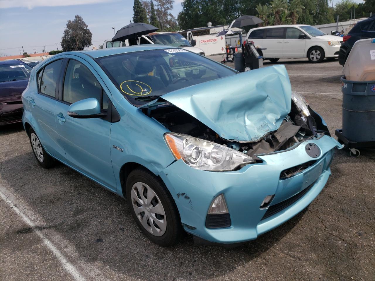 TOYOTA PRIUS C 2014 with VIN JTDKDTB32E1075645 - Photo from auction