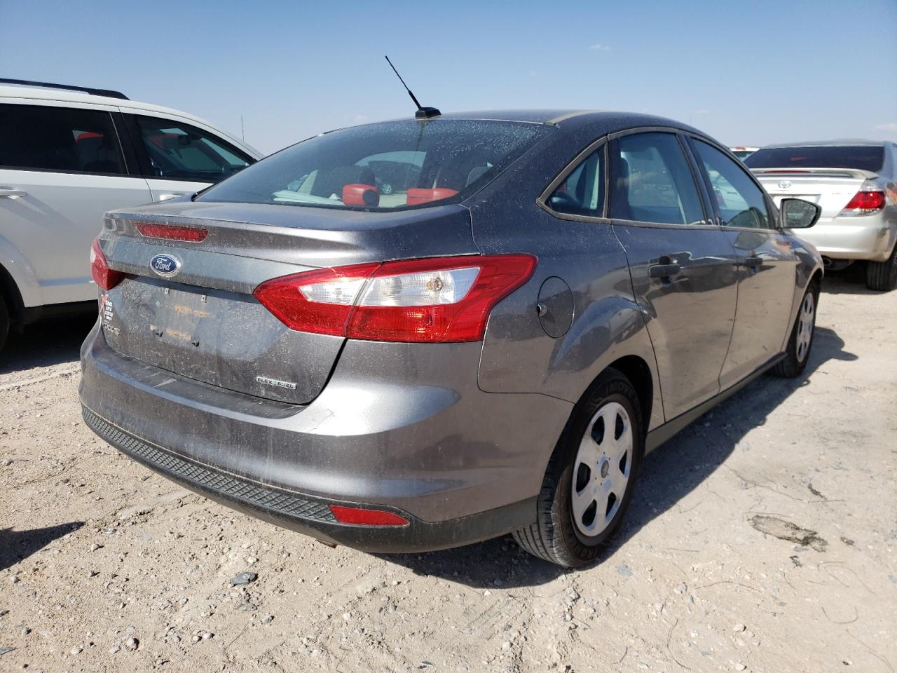 Photo 4 from auction – 2014 FORD FOCUS S with VIN 1FADP3E24EL419764