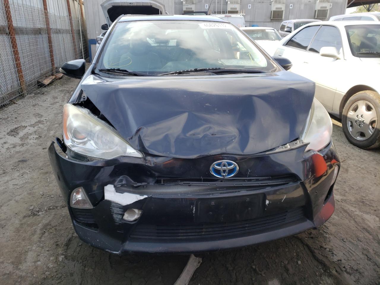 Photo 9 from auction – 2012 TOYOTA PRIUS C with VIN JTDKDTB3XC1028859