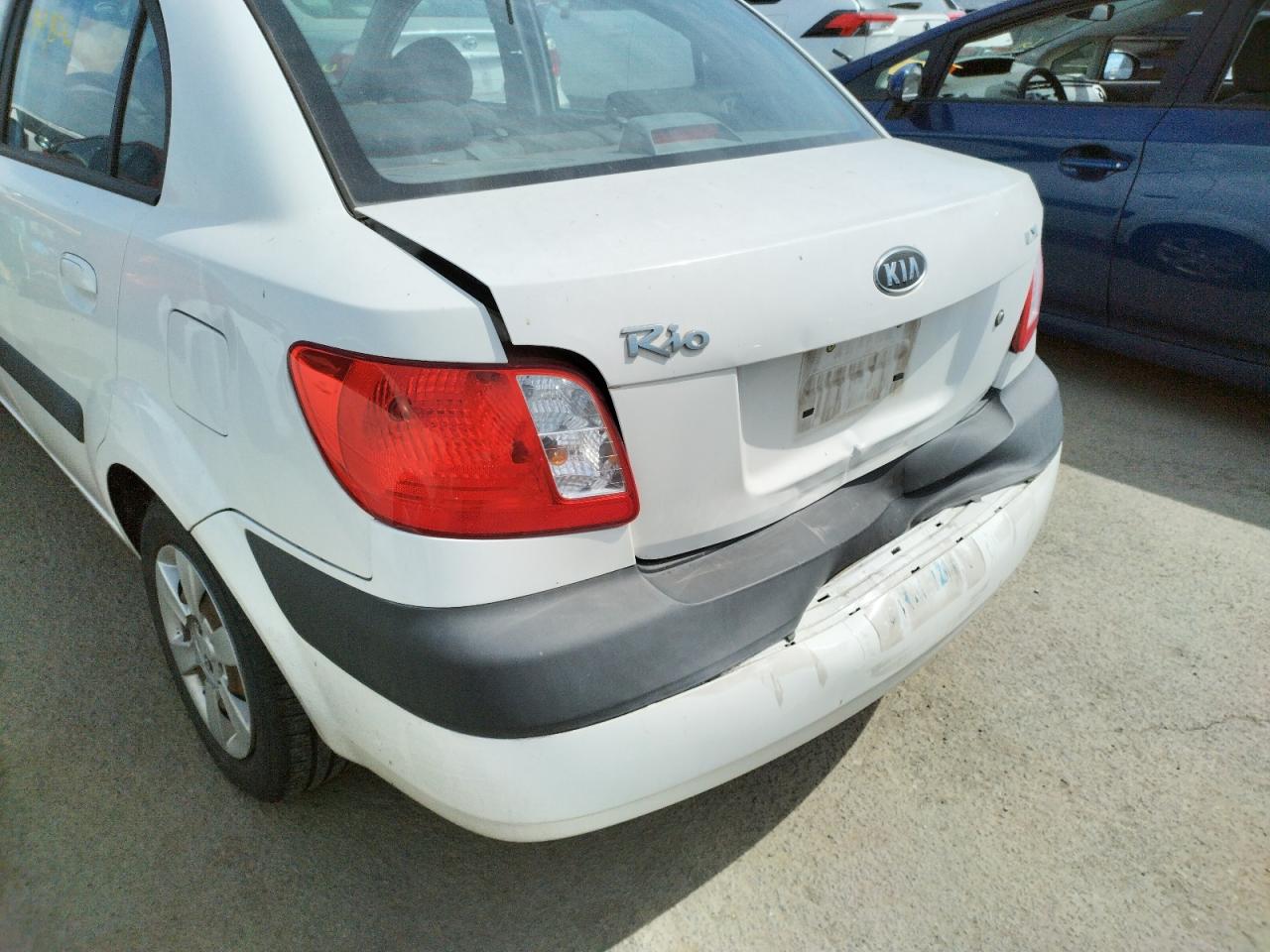 Photo 9 from auction – 2007 KIA RIO BASE with VIN KNADE123976208589