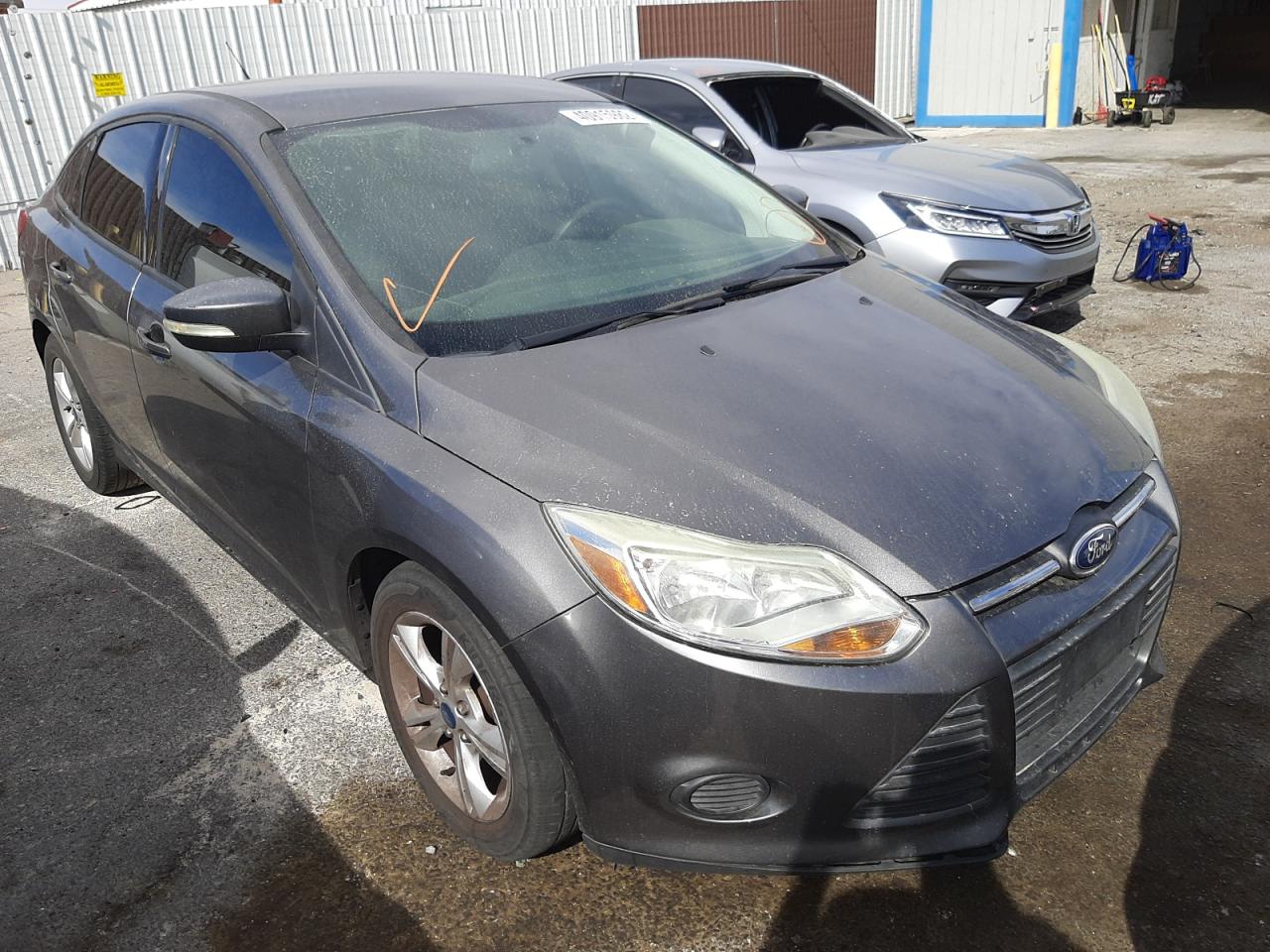 FORD FOCUS SE 2013 with VIN 1FADP3F24DL112026 - Photo from auction